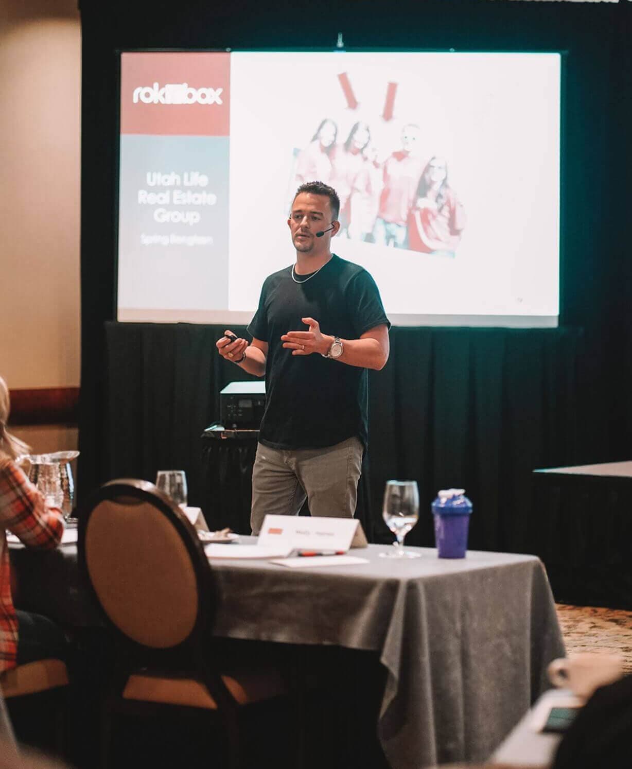 Josh Cunningham presenting to a real estate team